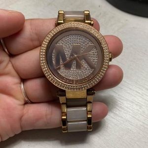 Michael Kors rose gold 39mm woman’s watch